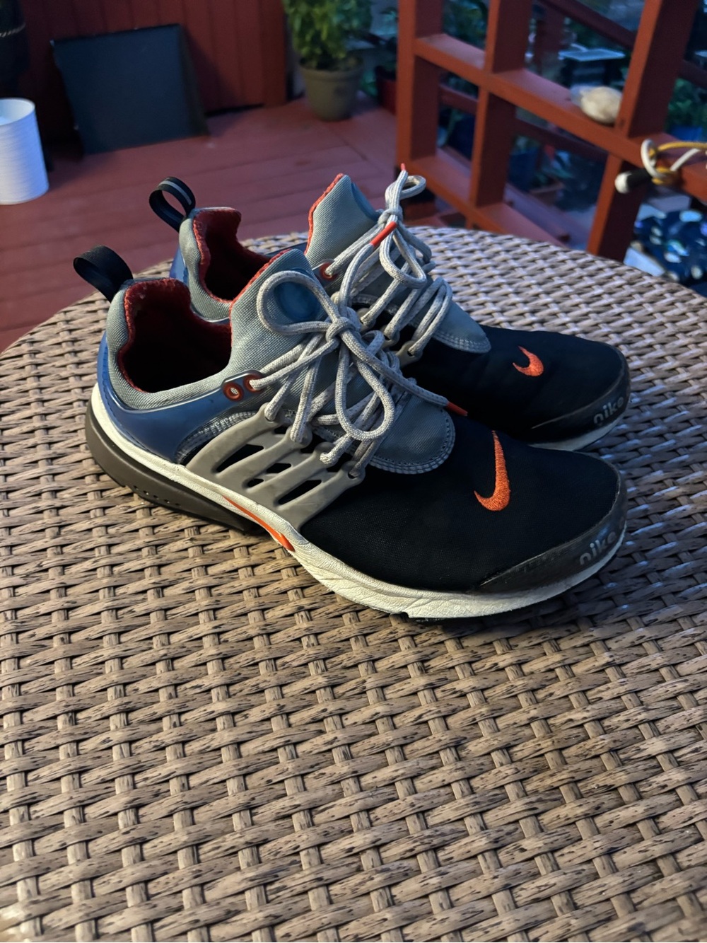 Nike Men’s Black and Blue Lace-Up Sneakers with Orange Swoosh